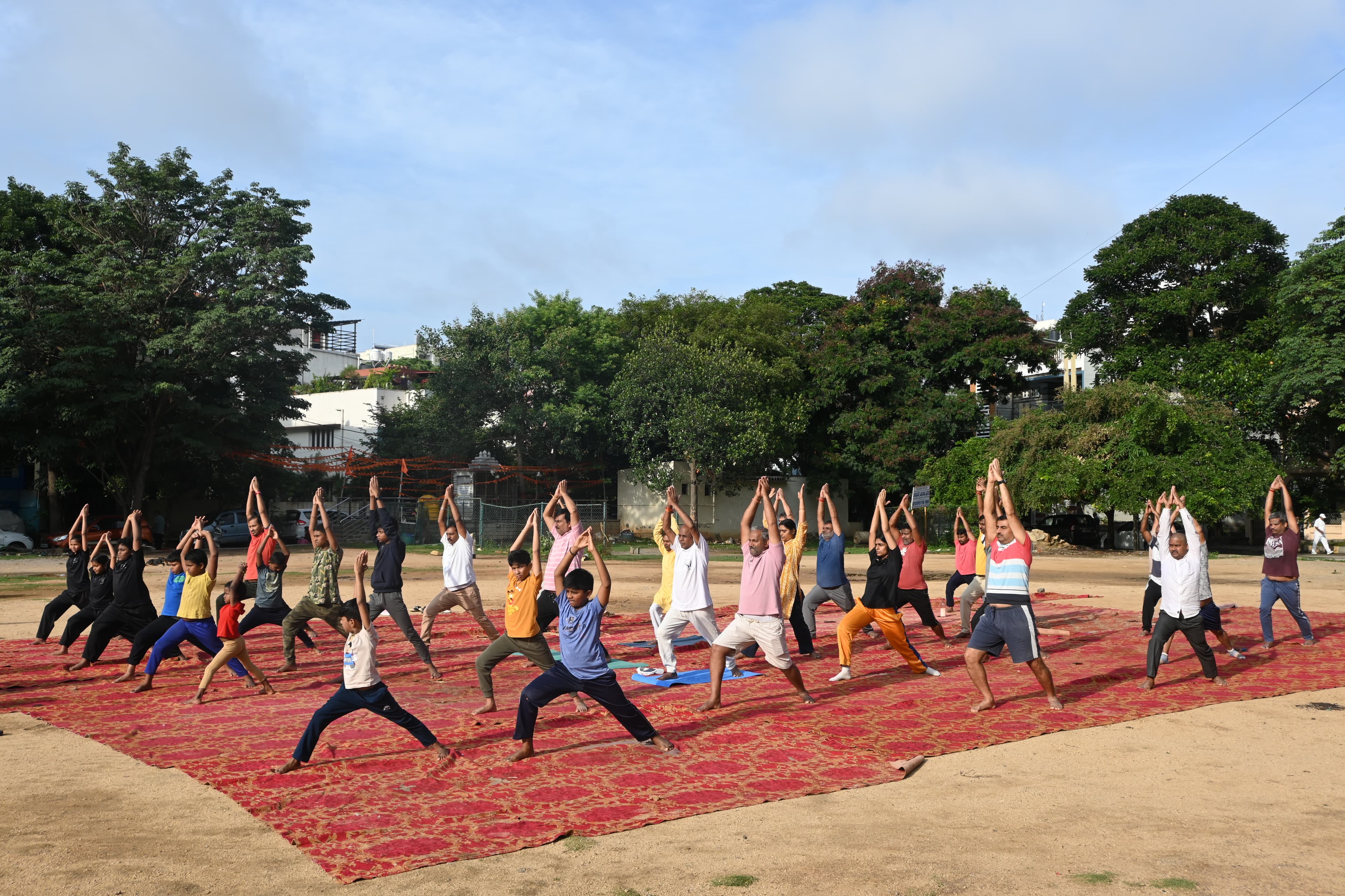 Students practising yoga on International Yoga Day